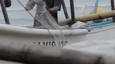 Fisherman pulling a net Video stock 71707606