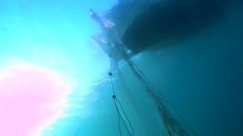 Fisherman is Pulling the Net Out From the Sea Stock Footage 144672865