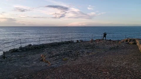 Fisherman pulling the rod at sunset Stock Footage 132542747
