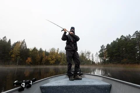 Fisherman ready to cast Stock Photos