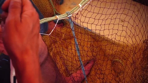 Fisherman Repairs Fishnets and Fishing Lines - Free HD Video Clips