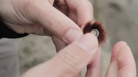 Fisherman Rigging a Fly Streamer, HD Stock Footage 83630490