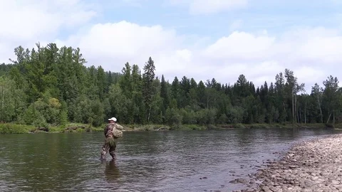 Fisherman on a river Stock Footage 80562485