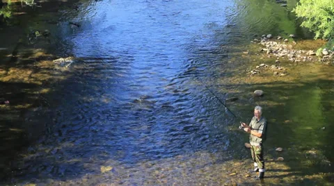Fisherman in the river, tilt down. Stock Footage 27820086