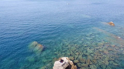 Fisherman on the rock Stock Footage 244012134