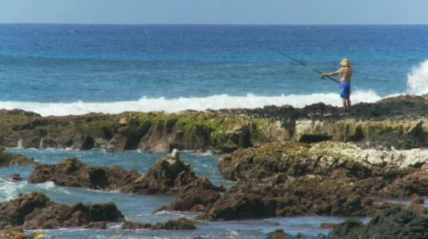 Fisherman on the Rocks Stock Footage 418067
