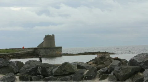 Fisherman on rocks Video stock 858259