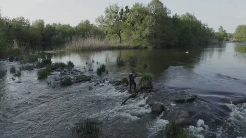 Fisherman with rod at the river stream. Stock Footage 152854957