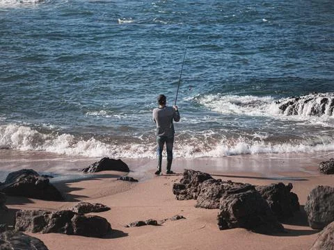 Fisherman on the seaside Stock Photos