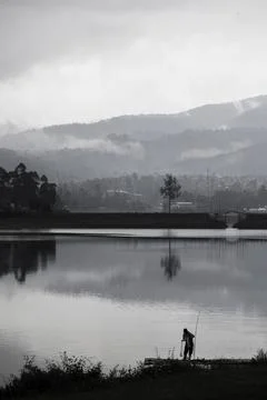 Fisherman on Situ Cileunca, West Java, Indonesia. Stock-Fotos