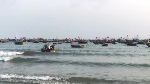 Fisherman on small boat in a beautiful sunset Stock Footage 151381153