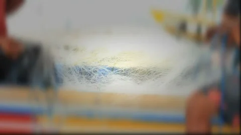 Fisherman sorting their nets and pulling them on board their boat Stock Footage 35874542