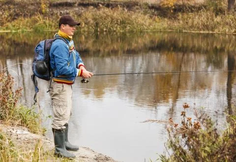 Fisherman with spinning. Foto stock