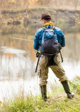 Fisherman with spinning. Stock Photos