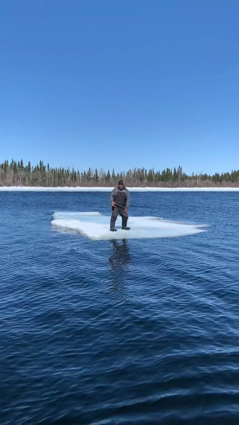 Fisherman Stranded on Drifting Ice Sheet, Weagamow Lake, Ontario, Canada - 26 Ap Stock Footage 205348273