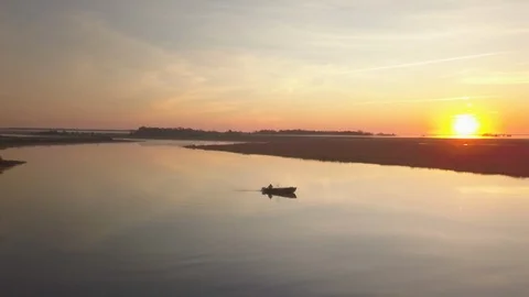 FISHERMAN SUNRISE on RIVER 1  Stock Footage 120701989