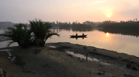 Fisherman into sunset Stock Footage 889403