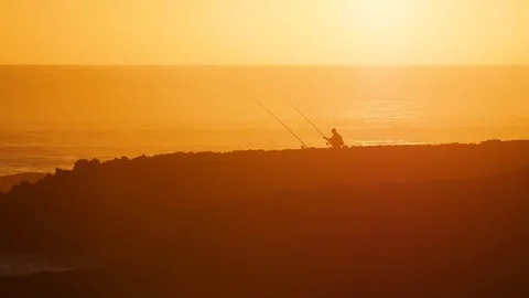 Fisherman at Sunset Morocco Ocean Shore Stock Footage 86317153