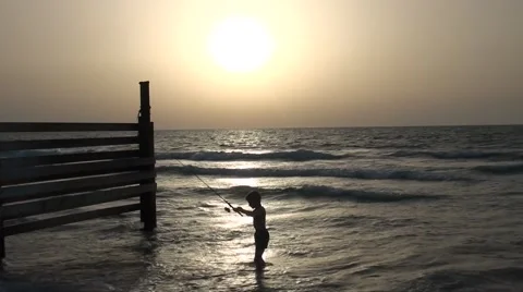 Fisherman at sunset a sun Stock Footage 41795575