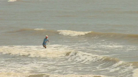 Fisherman in Surf Stock Footage 356587