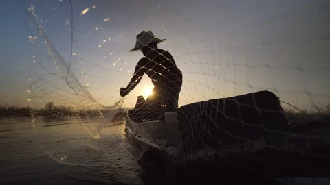 Asian Fisherman Throwing Net Stock Footage ~ Royalty Free Stock Videos