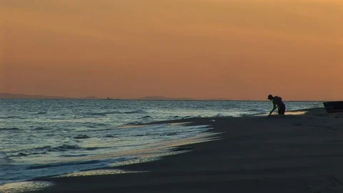 Fisherman Throwing Net For Fish At Sunset Stock Footage 127920056