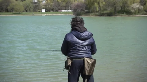 A fisherman throws his rod, arabian Stock Footage 95999953