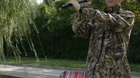 Fisherman throws tackle and get ready to fish. Fishing in the city Video stock 114982533