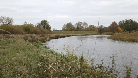 The fisherman walking to the river Stock Footage 72040382