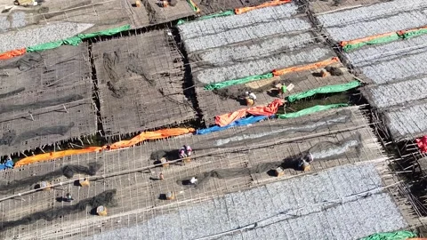 FISHERMAN WHEN DRYING FISH ON THE BEACH SUMBAWA INDONESIA Stock Footage 231201846