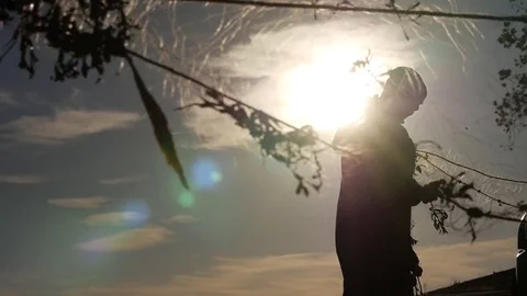Fisherman working fish net sunset Stock Footage 78631972