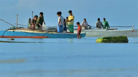 Fisherman's Family preparing the fish Stock Footage 48498364