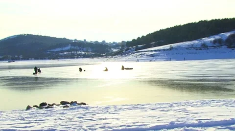 Fishermans on the Frozen Lake Stockbeeldmateriaal 7737726