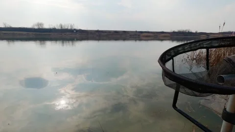 Fisherman's point of view: pulling out a fish out of the water Stock Footage 263148945