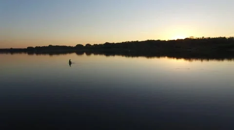 Fishermans in sunset on the river 動画素材 56303727
