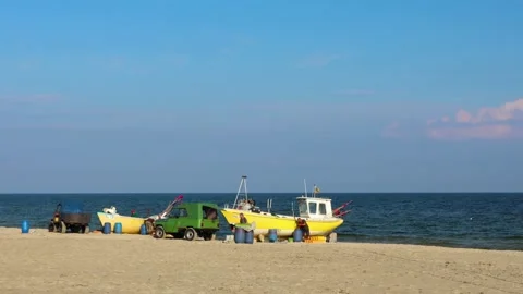 Fishermen after returning from the catch, the Baltic Sea Stock Footage 147381525