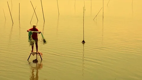 Fishermen are catching fish with nets. Slow motion Video stock 92290211