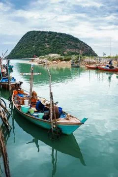 Fishermen are gathering mussel on thier boat Stock Photos