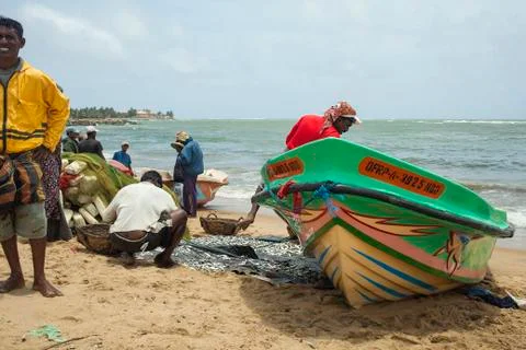 Fishermen on the beach 스톡 사진