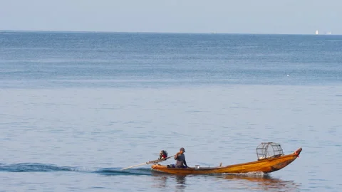 Fishermen in a boat with crab nets Stock Footage 332164559