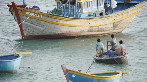 Fishermen on boat floating and preparing for sailing. Vietnamese lifestyle Stock Footage 56299449