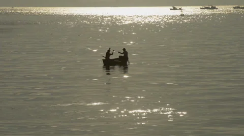Fishermen on the boat in the sunset Stock Footage 35619304