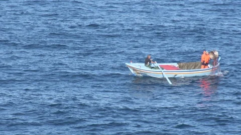Fishermen with boat working with nets Video stock 123324204
