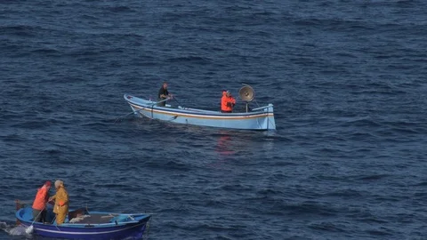Fishermen with boat working with nets Stock-Footage 123331489