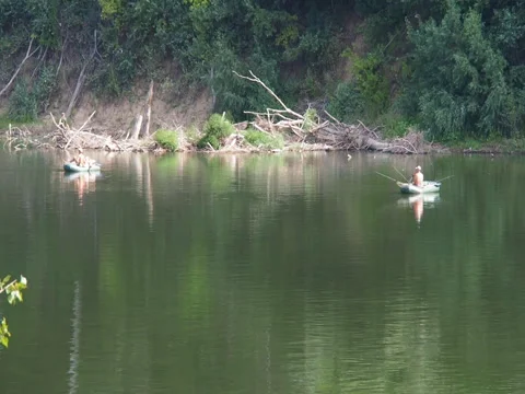 Fishermen in boats are fishing. Stock Footage