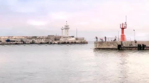 Fishermen on the breakwater 스톡 동영상 47259085