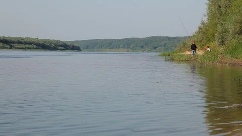 Fishermen catch fish in the river Stock Footage 79342624