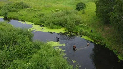 Fishermen Catch Fish In River With Net Stock Footage 232031364