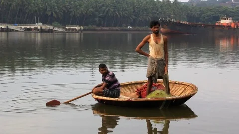 Fishermen in Circular Boat Stock Footage 74563908