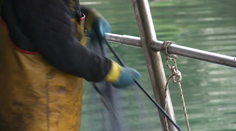Fishermen cleaning nets 11 Stock Footage 31281785
